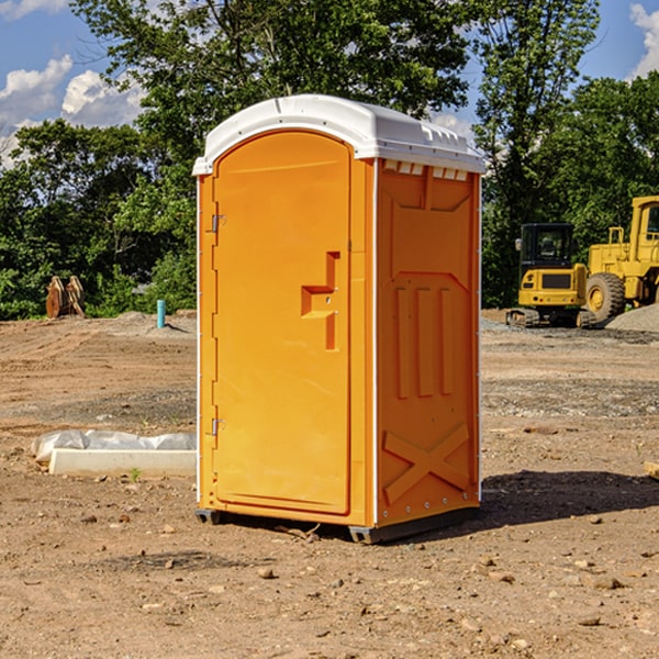 how often are the portable restrooms cleaned and serviced during a rental period in Panola